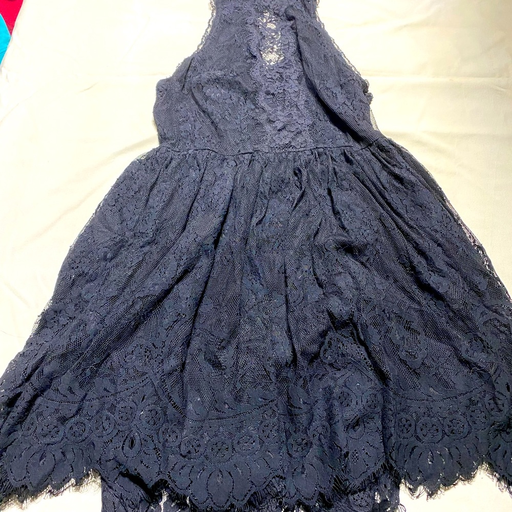 NWOT black lace mini dress. So beautiful and versatile to dress up or down